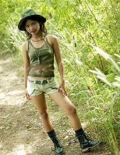 Petite Thai teen in full Army apparel and ready for duty